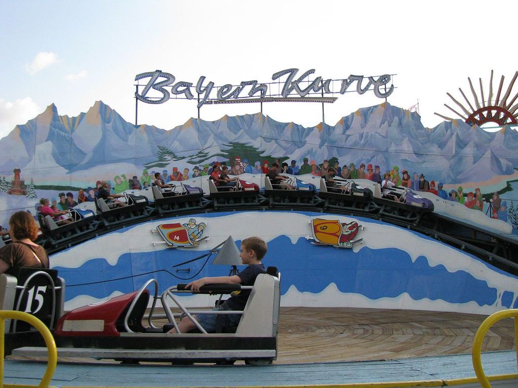 1280px-Bayern_Kurve_Day_1.jpg